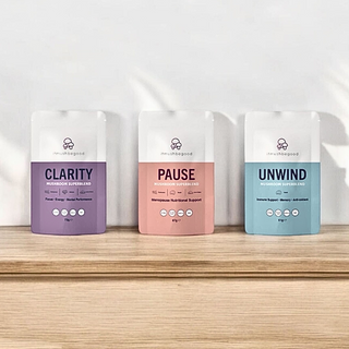 three mushroom superblend supplement sachets on a shelf